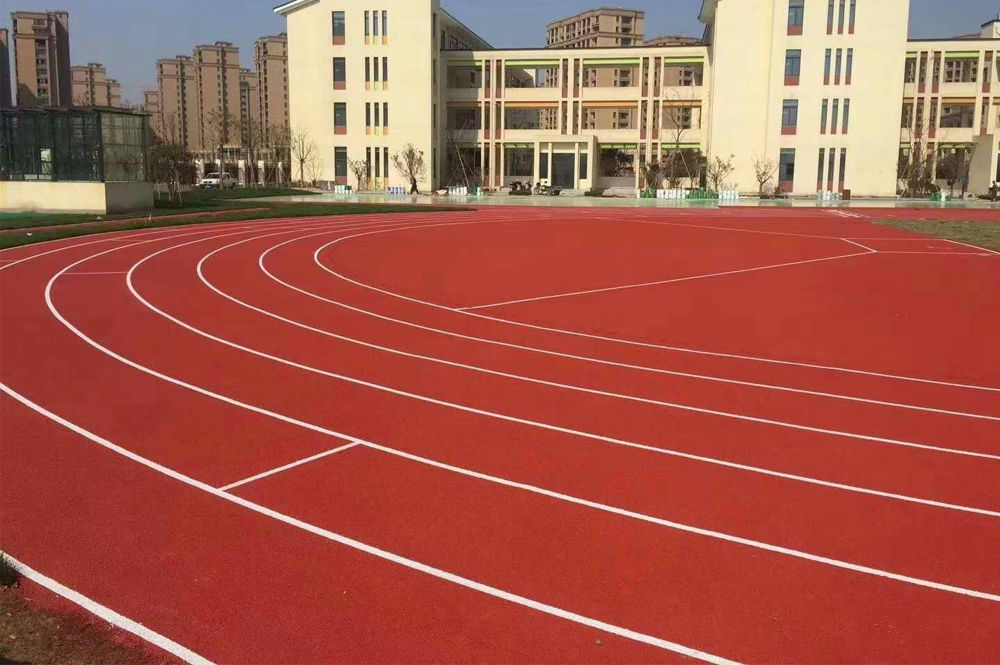 Synthetic athletic running track